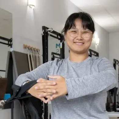Stella An, Pilates and Gyrotonic instructor at Momentum Pilates